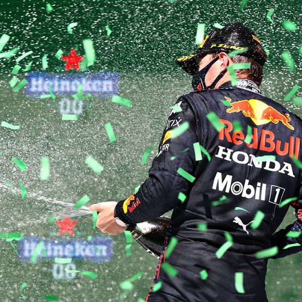 PORTIMAO, PORTUGAL - MAY 02: Second placed Max Verstappen of Netherlands and Red Bull Racing celebrates with sparkling wine on the podium during the F1 Grand Prix of Portugal at Autodromo Internacional Do Algarve on May 02, 2021 in Portimao, Portugal. (Photo by Mark Thompson/Getty Images)
